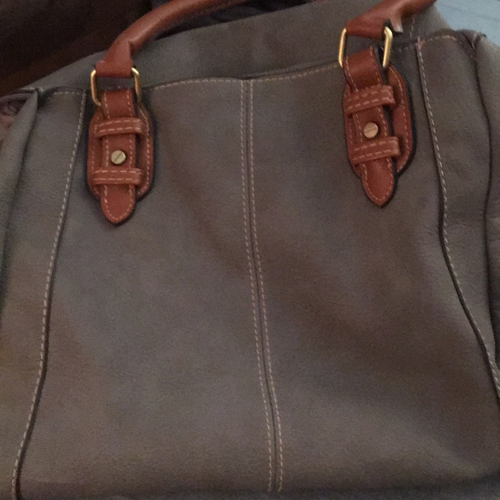 Gray purse with pink charging wallet